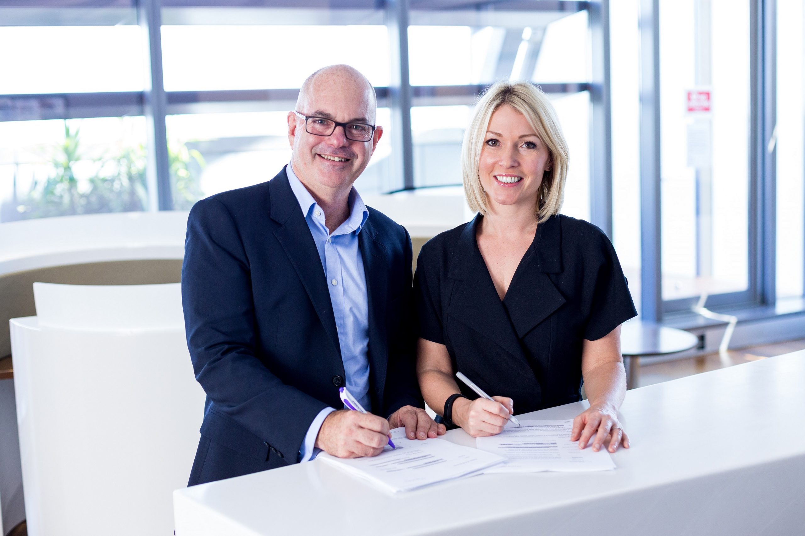 https://www.turnthetablespr.com/app/uploads/2020/05/Brad-Adams-and-Gemma-Tumelty-signing-the-Master-Franchise-agreement-in-Australia_s-1-scaled.jpg